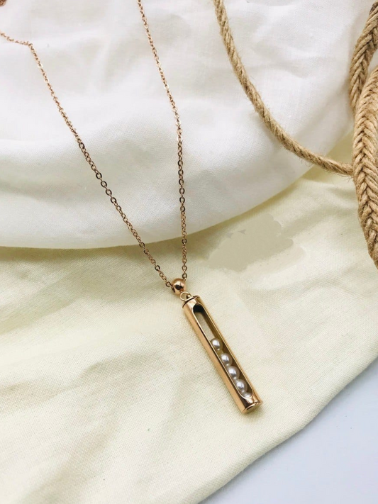 Buy Rose Gold Rectangle Pendant Necklace with Moving Pearls - TheJewelbox