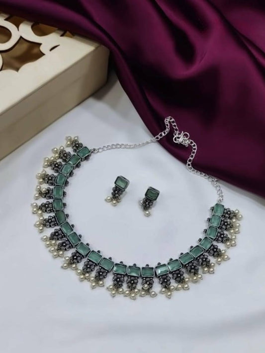 Buy Sea Green Stone Studded German Silver Choker Necklace Set - TheJewelbox