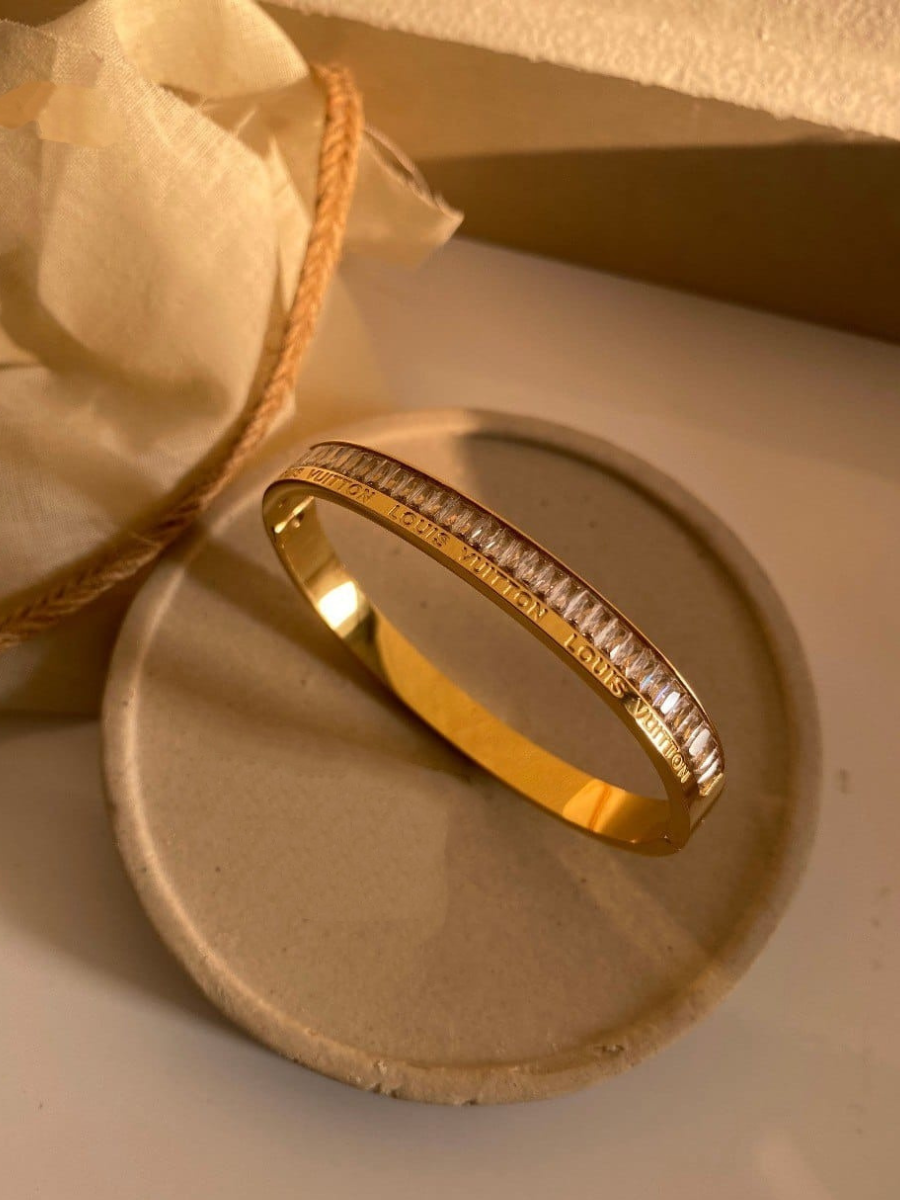 Buy Thick Gold Oval Shaped Diamond Bangle Bracelet - TheJewelbox